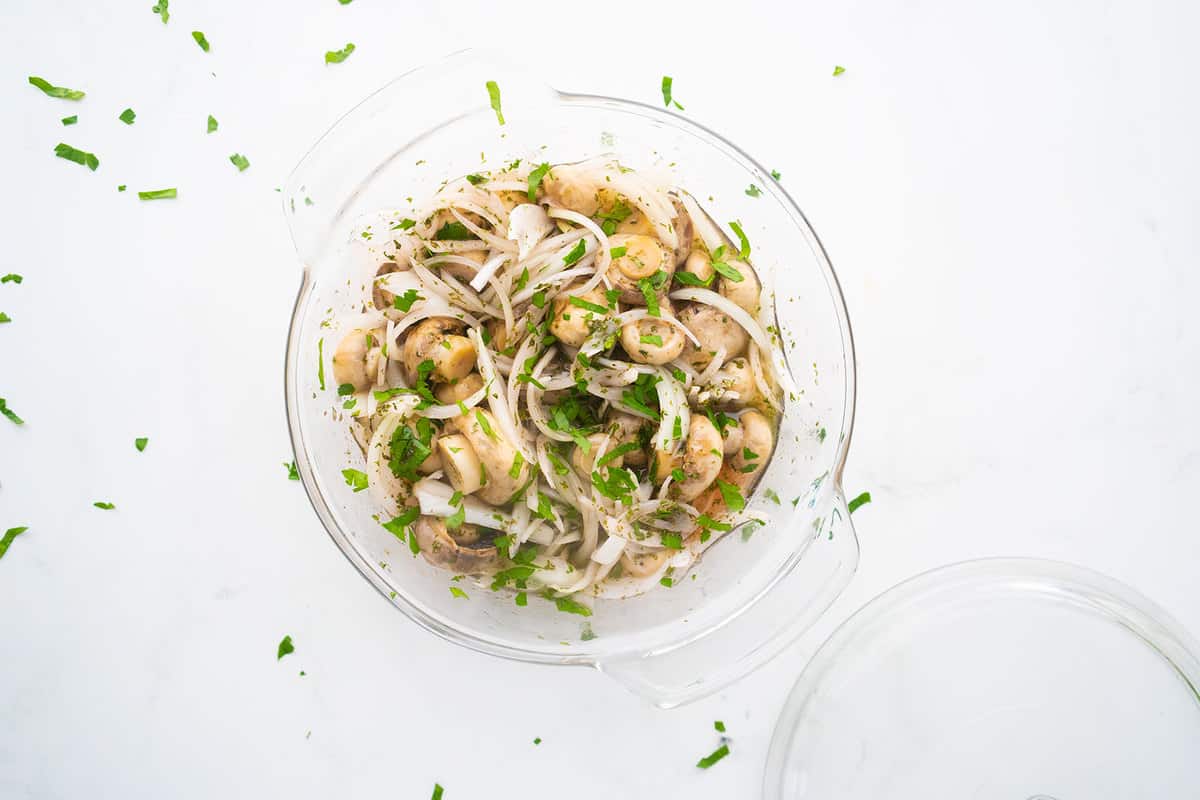 Marinated Mushrooms in a clear bowl