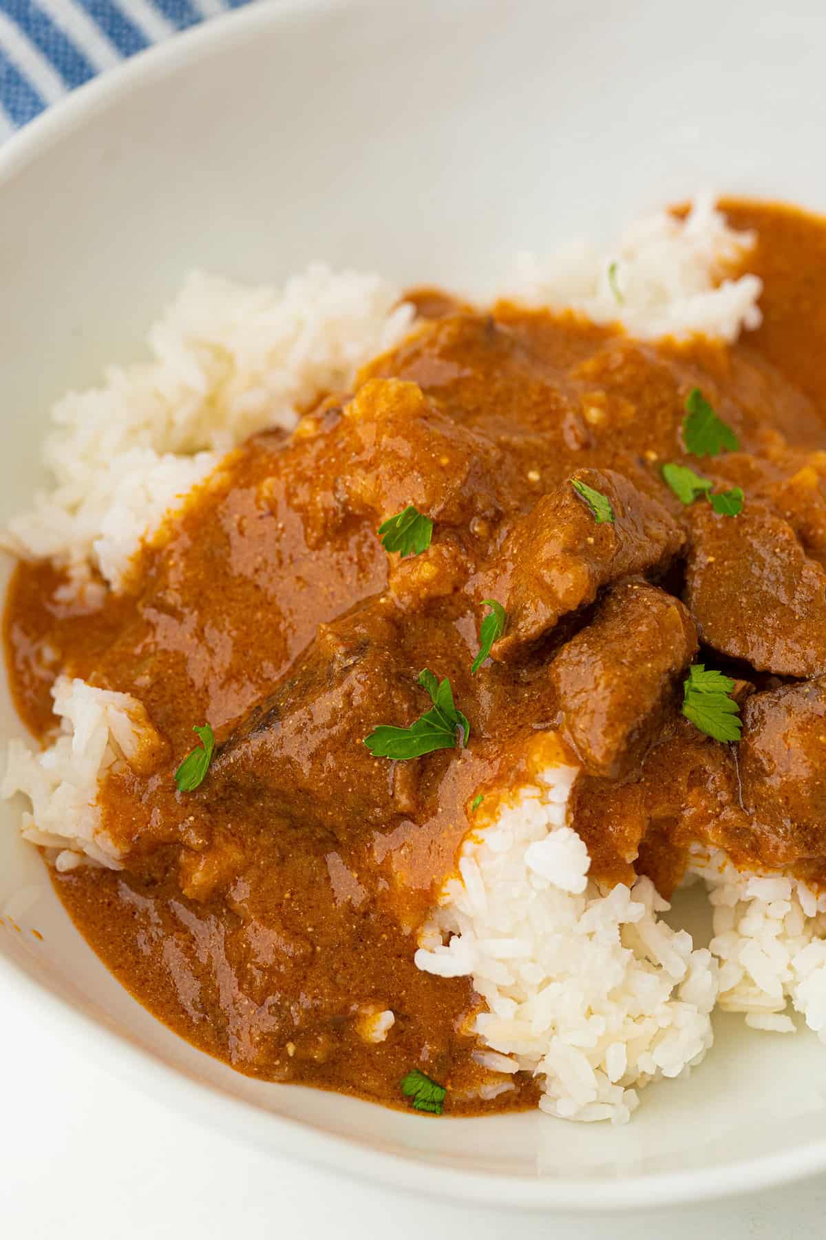 Hungarian Goulash on white rice in a bowl