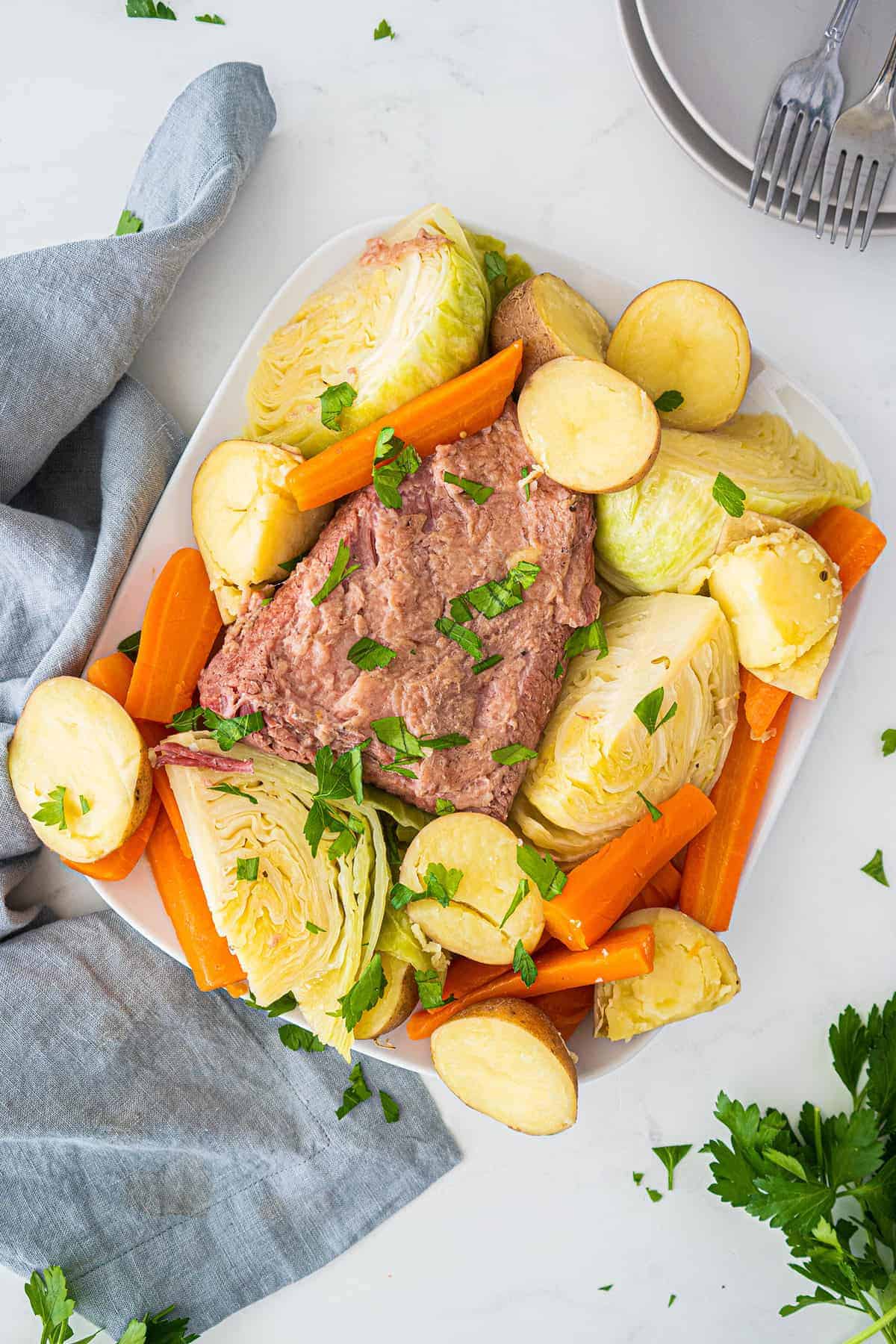 Corned Beef and Cabbage on a white platter