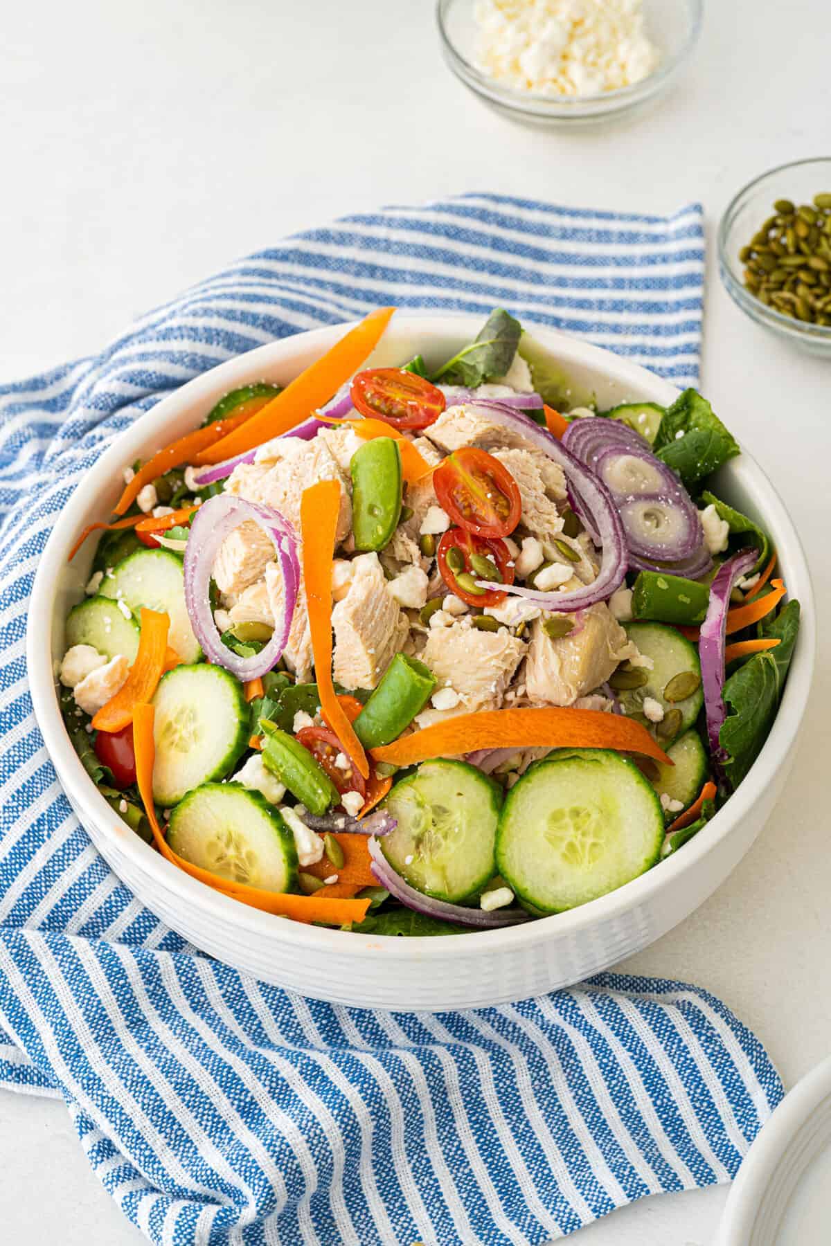 kale salad in a white bowl