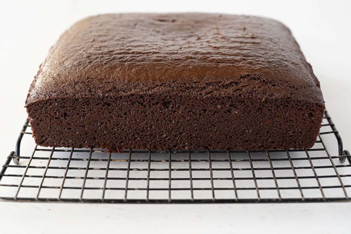 chocolate cake cooling on a wire rack 