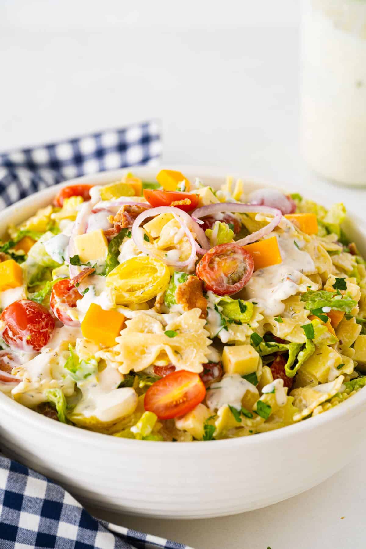 BLT pasta salad in a white bowl