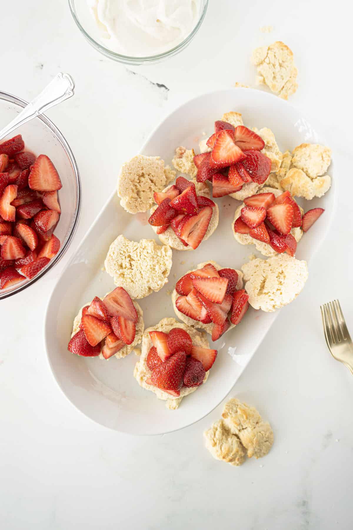 fresh strawberries on top of shortcakes 
