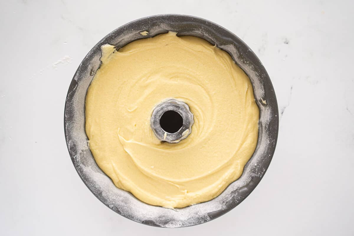 cream cheese pound cake batter in a bundt pan 