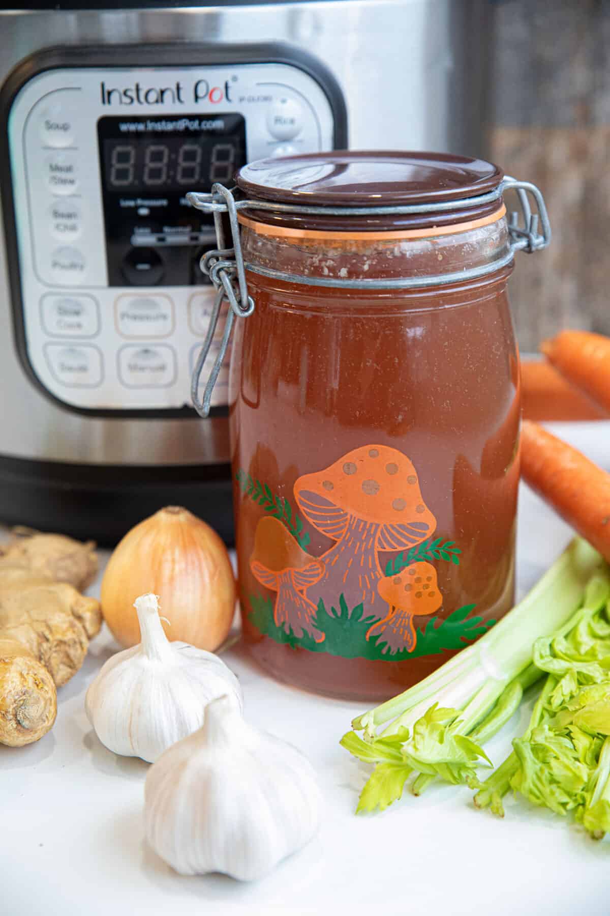 pork broth in a jar and an Instant Pot 