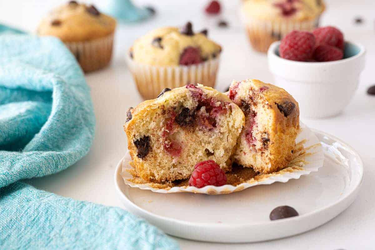 Raspberry muffins, cut in half on a muffin wrapper