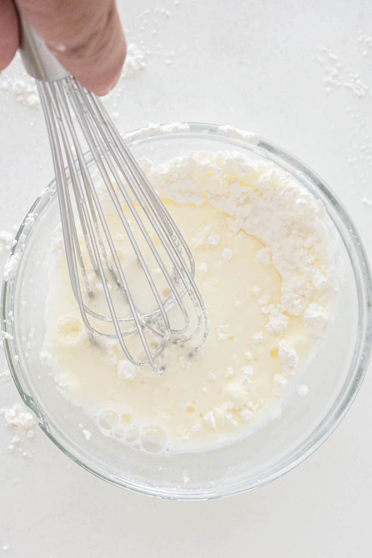 whisking a cornstarch slurry 