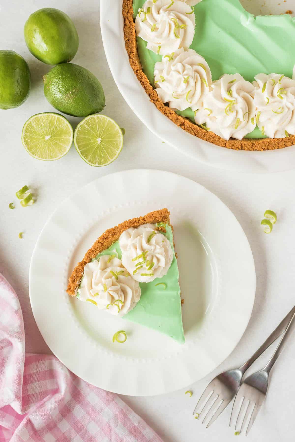 slice of key lime pie on a white plate 