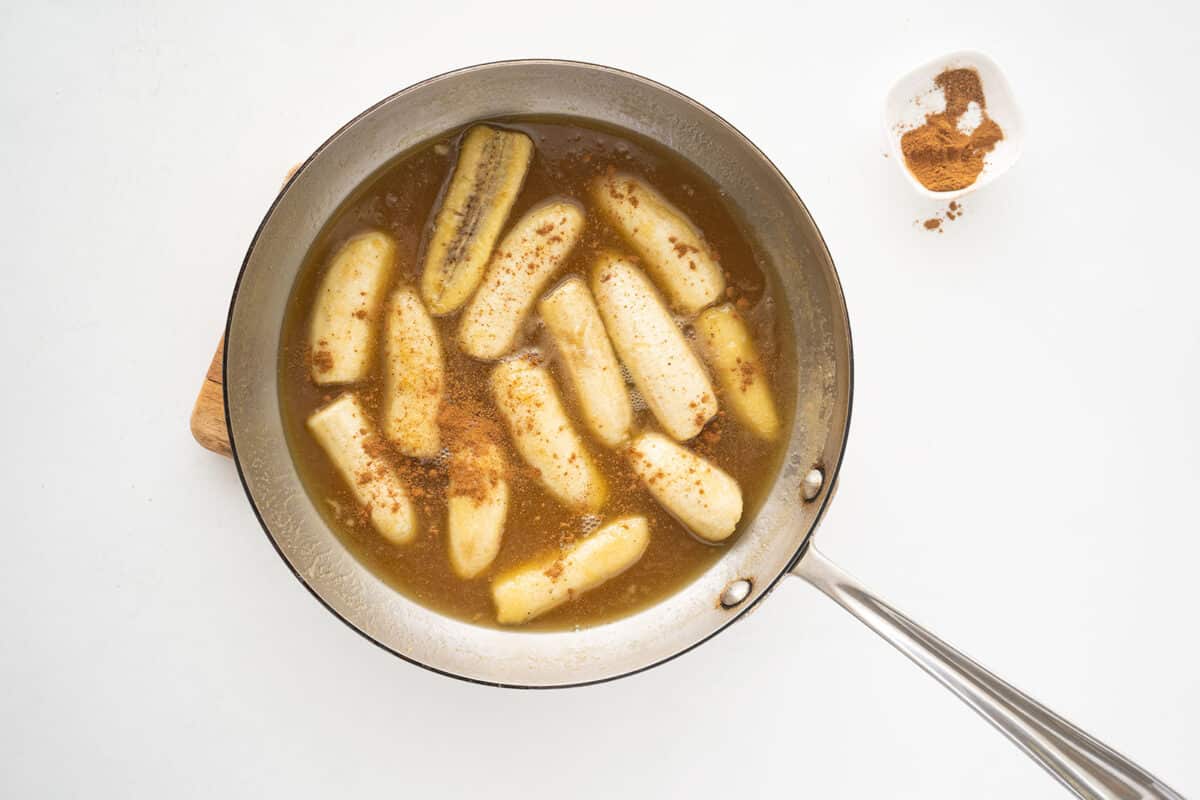 cooking bananas foster in a pan
