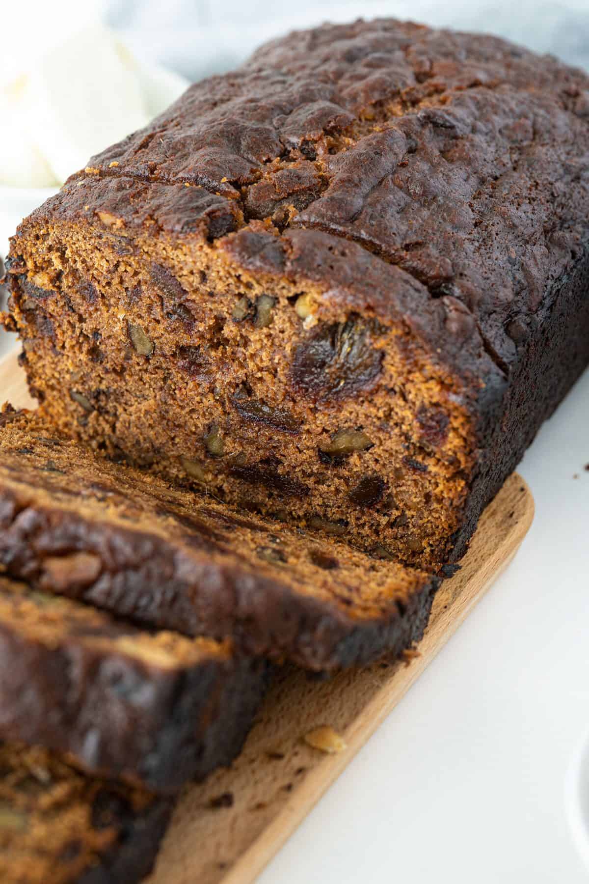 close up of sliced date nut bread 