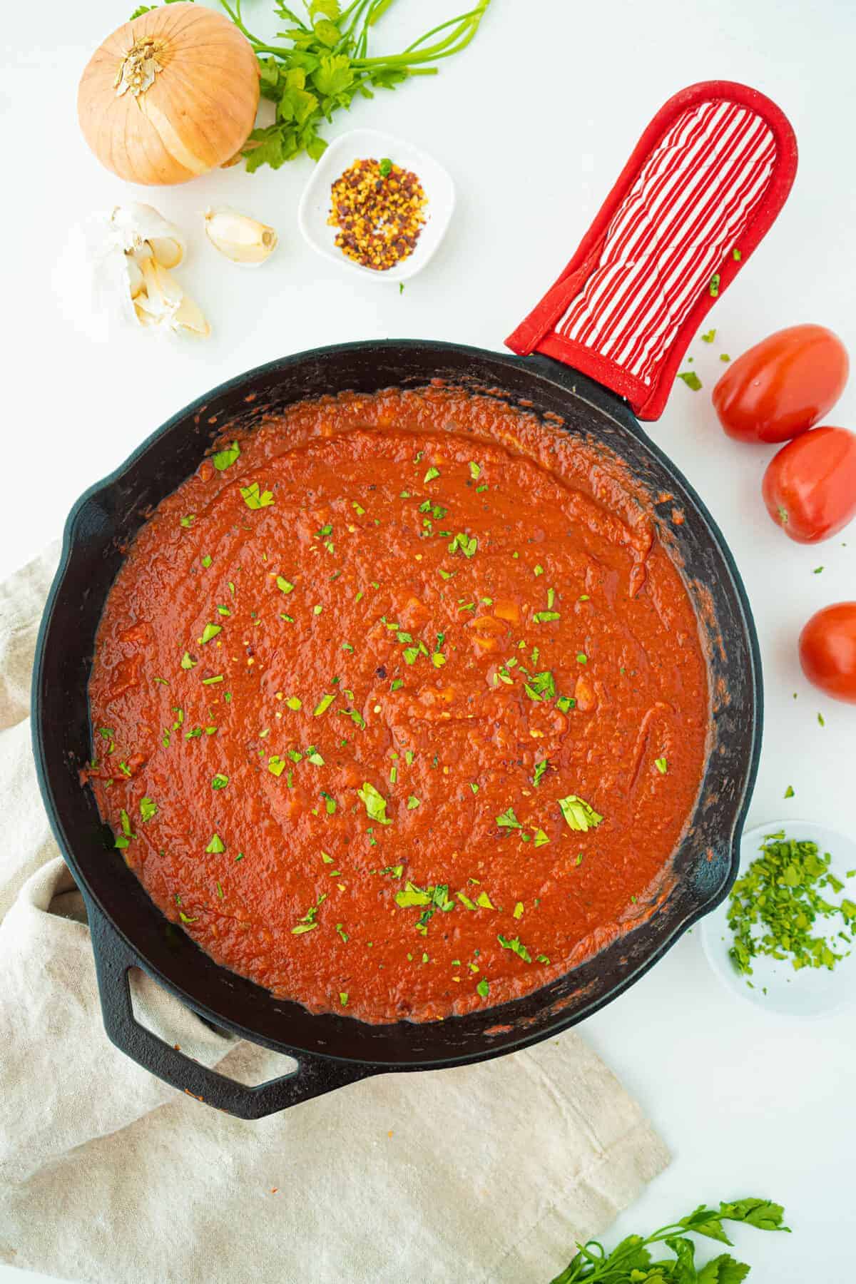 marinara sauce in a cast iron skillet