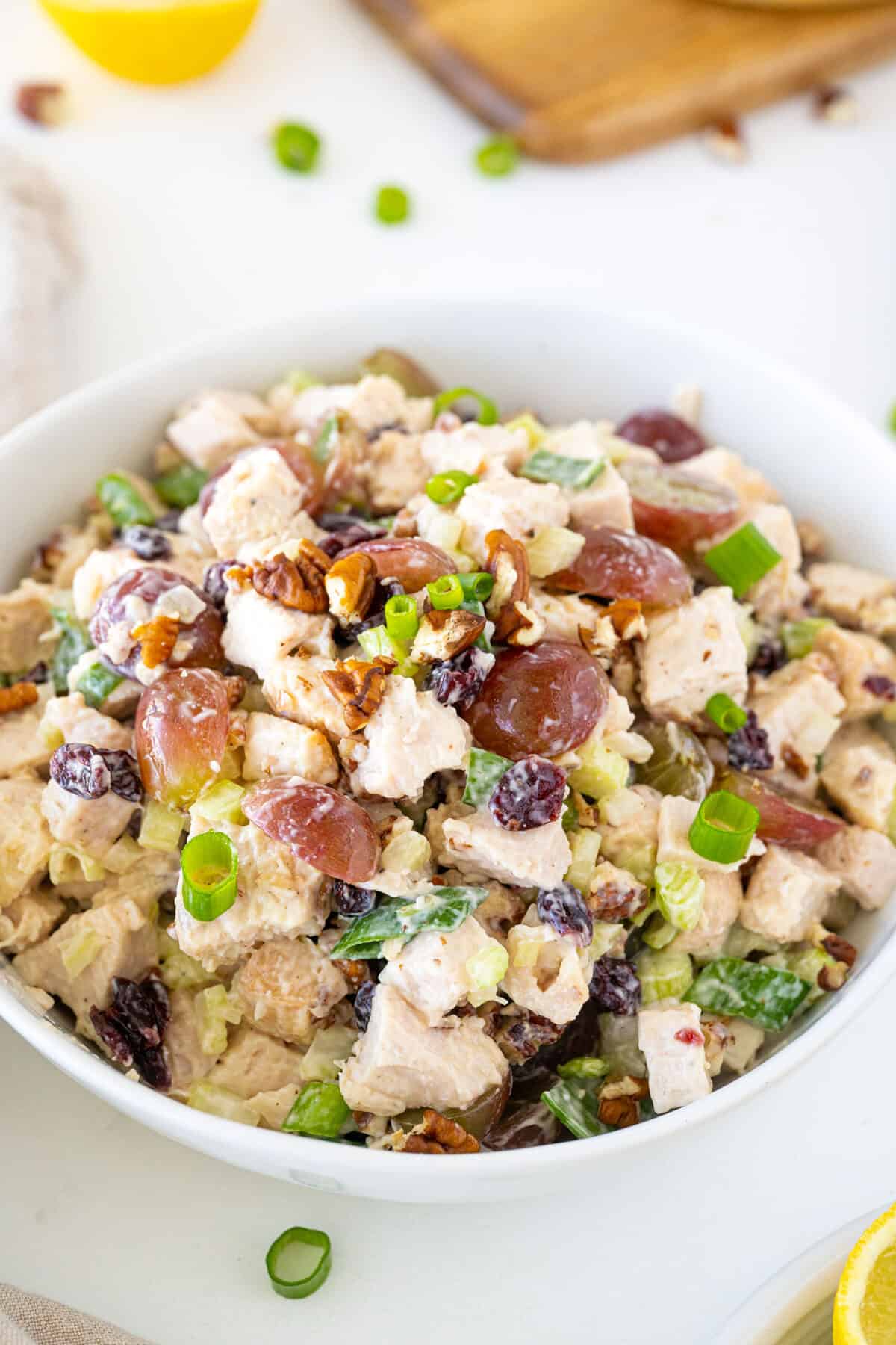close up of turkey salad in a white bowl
