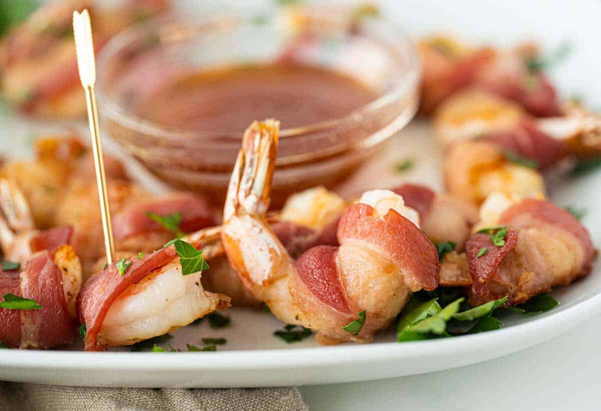 Bacon wrapped shrimp on a platter 
