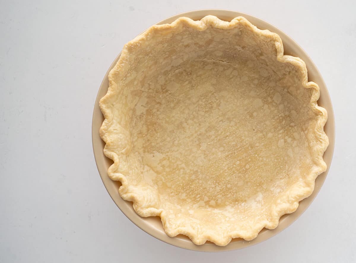 blind baked pie crust in a pie plate