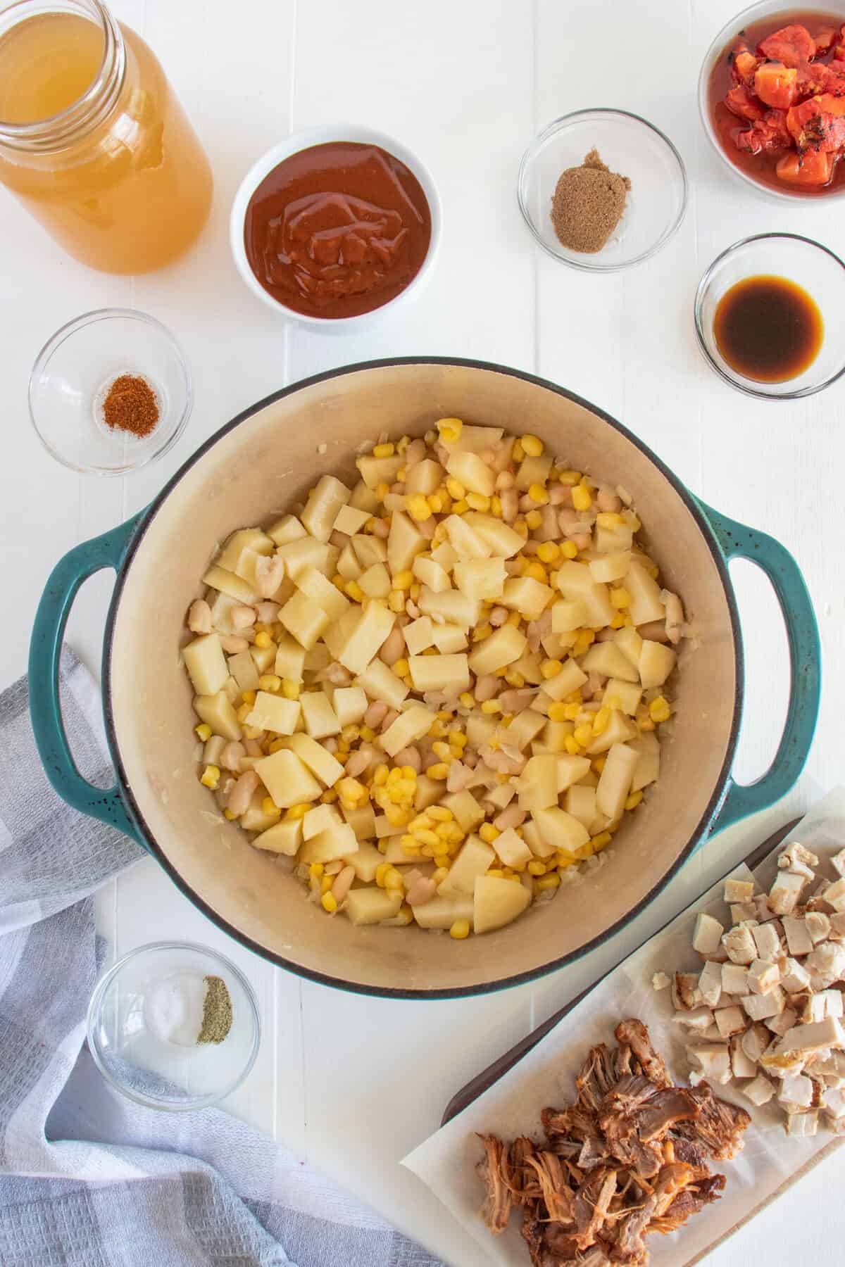 carrots and potatoes in a Dutch oven