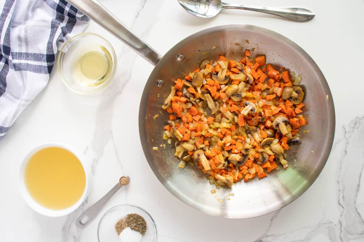 frying vegetables in a pan