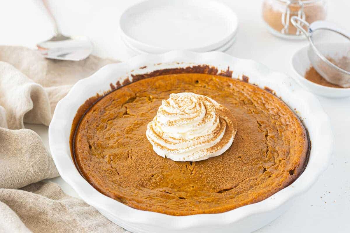 impossible pumpkin pie in a white pie plate