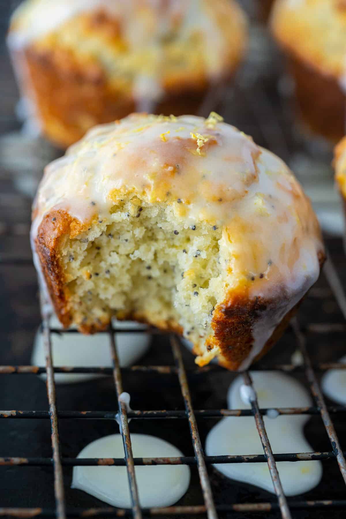lemon poppy seed muffins with a bite taken out of it