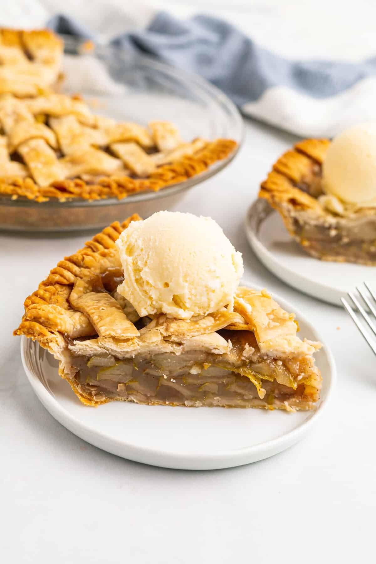 slice of pear pie on a white plate