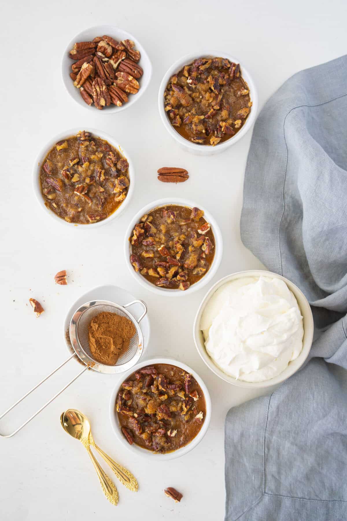 pumpkin custards on a white counter