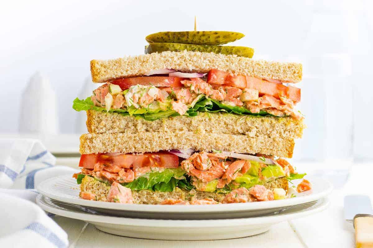 Salmon salad tucked in a soft sandwich bun.