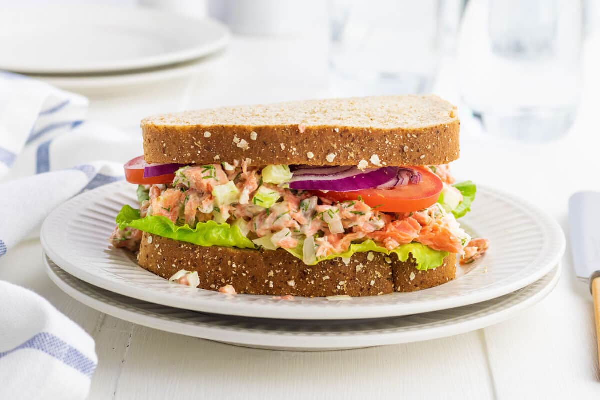 salmon salad sandwich on a white plate