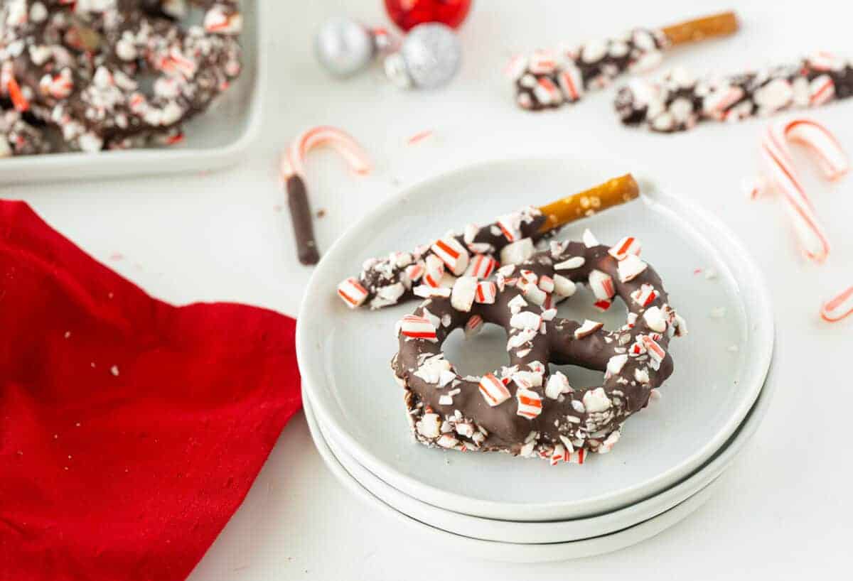 chocolate covered pretzels on a white plate 