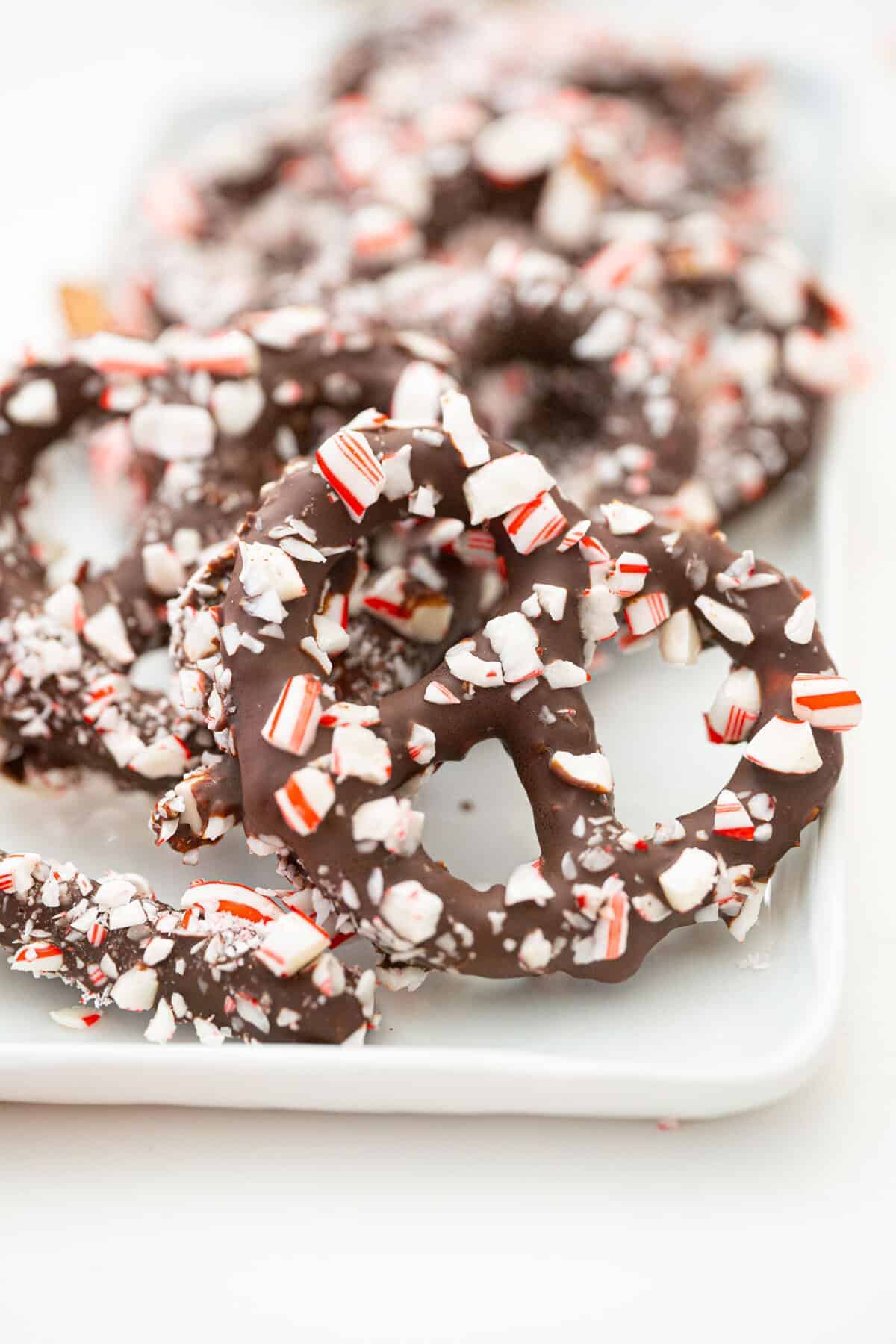 chocolate covered pretzel with crushed peppermint candy on top