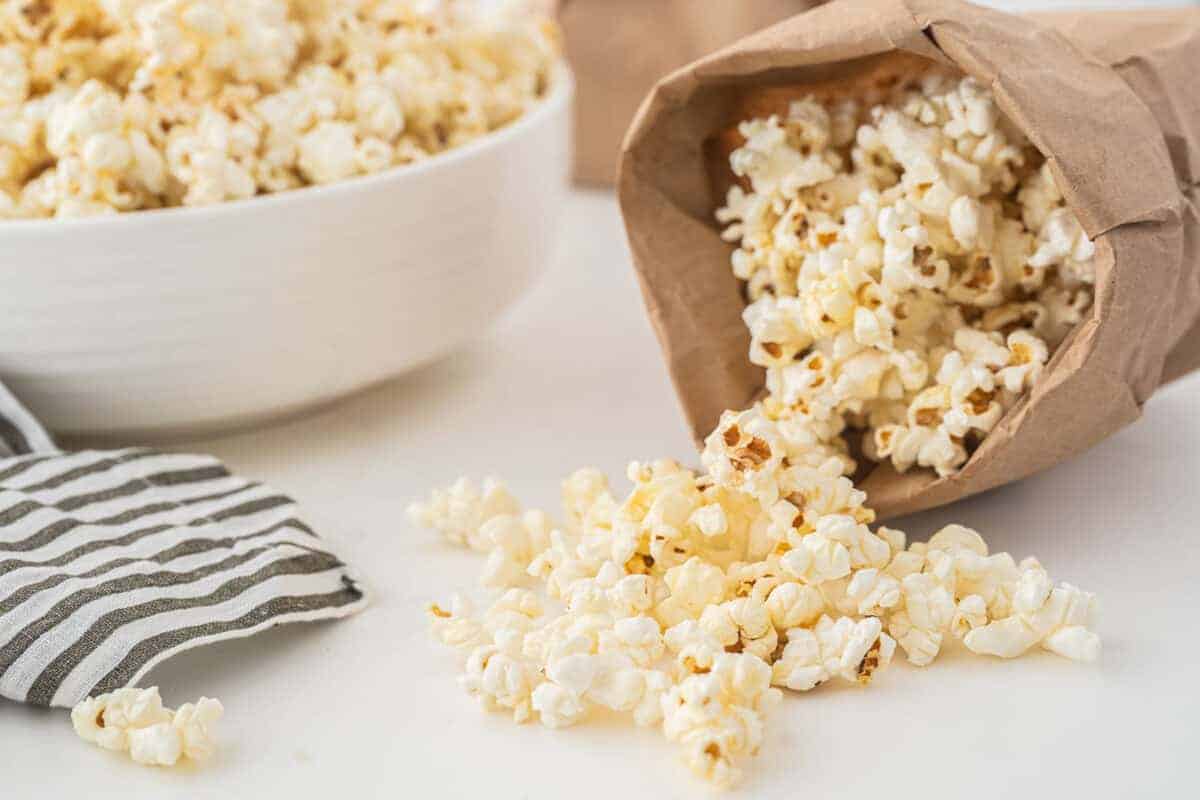 kettle corn in a brown paper bag