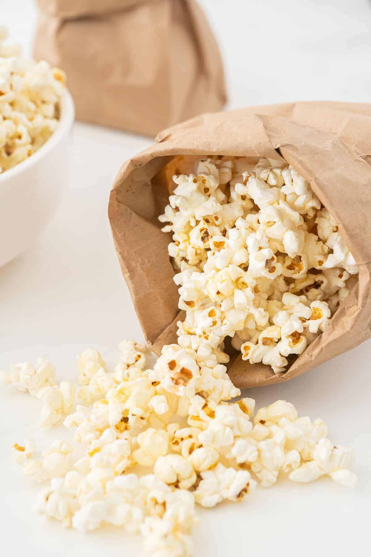 kettle corn in a brown paper bag