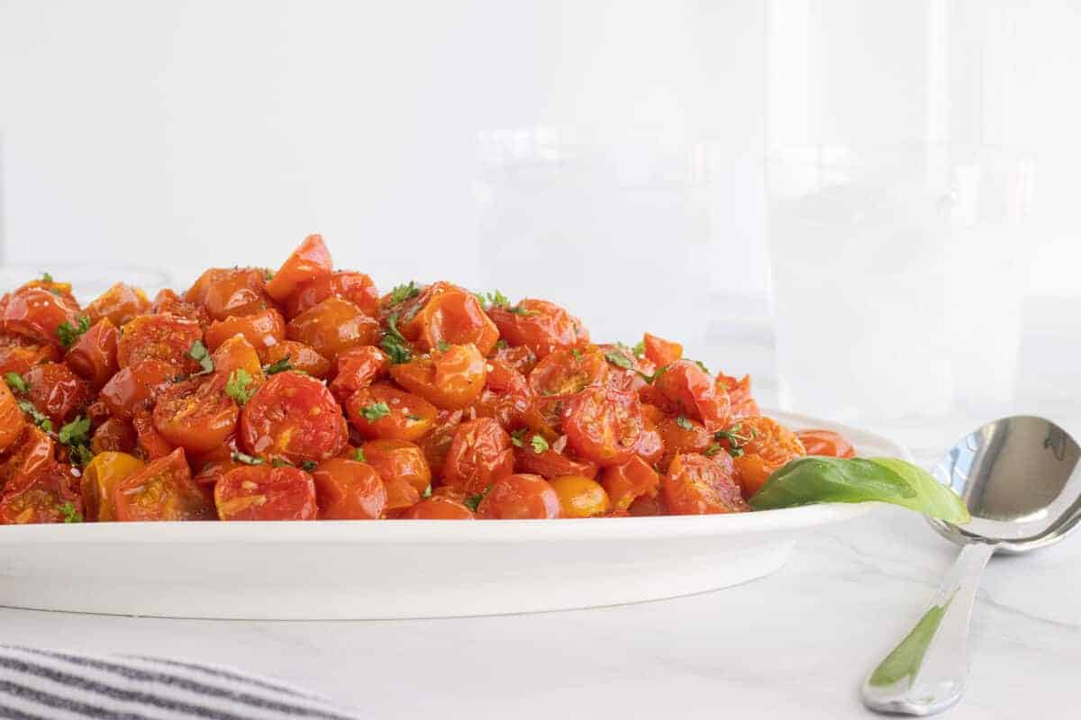 roasted cherry tomatoes on a white plate