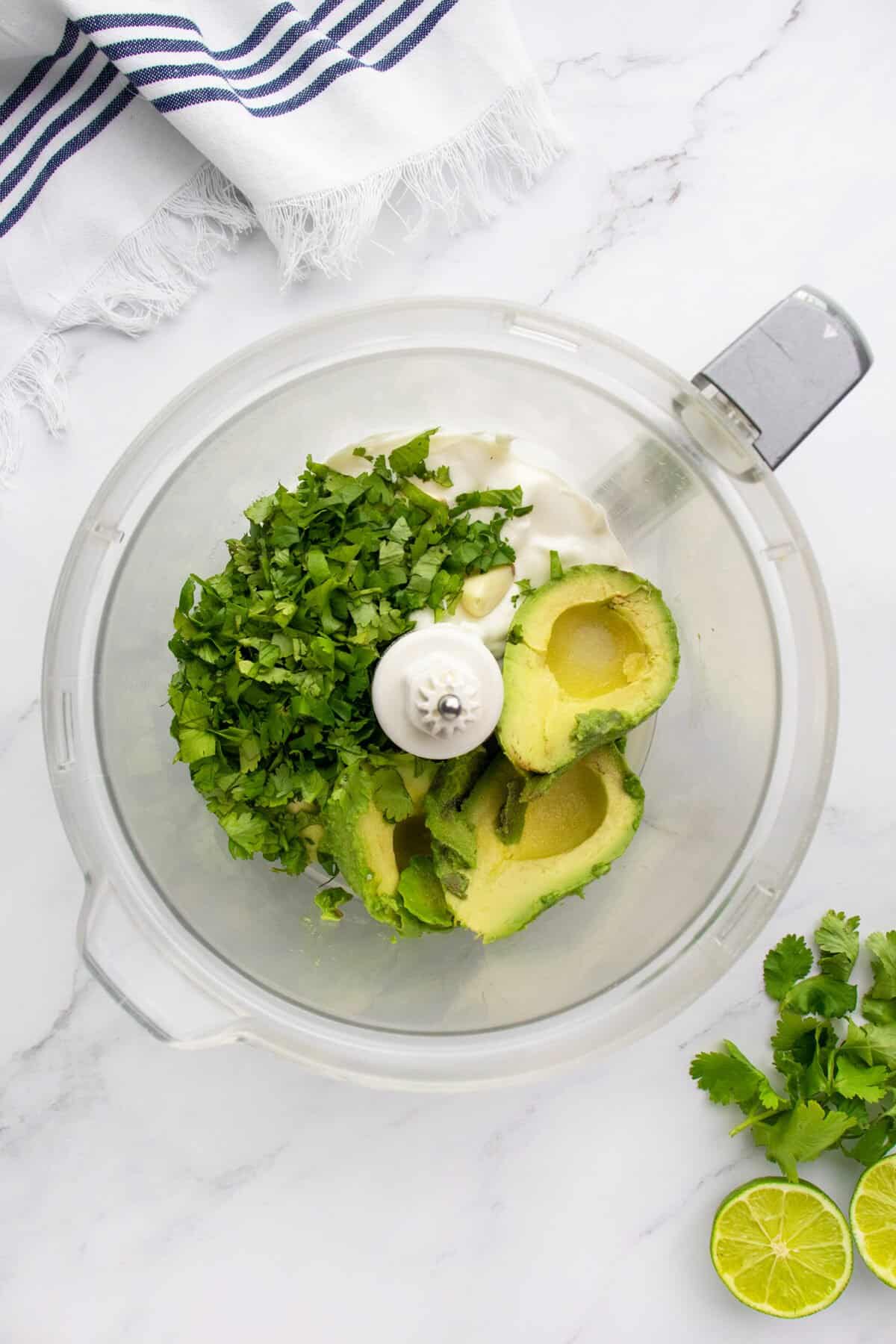 Avocado crema ingredients in food processor