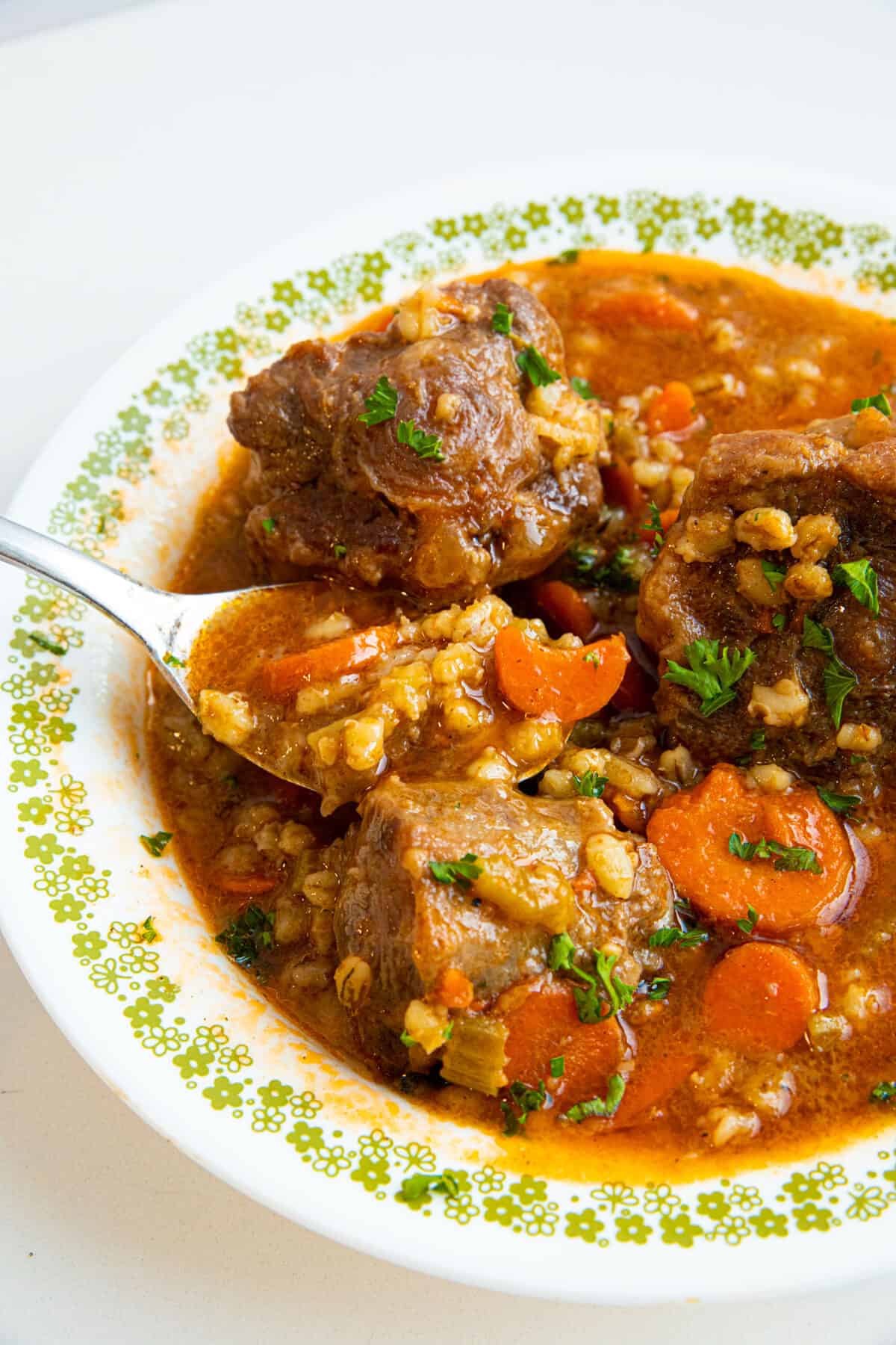 oxtail soup on a spoon