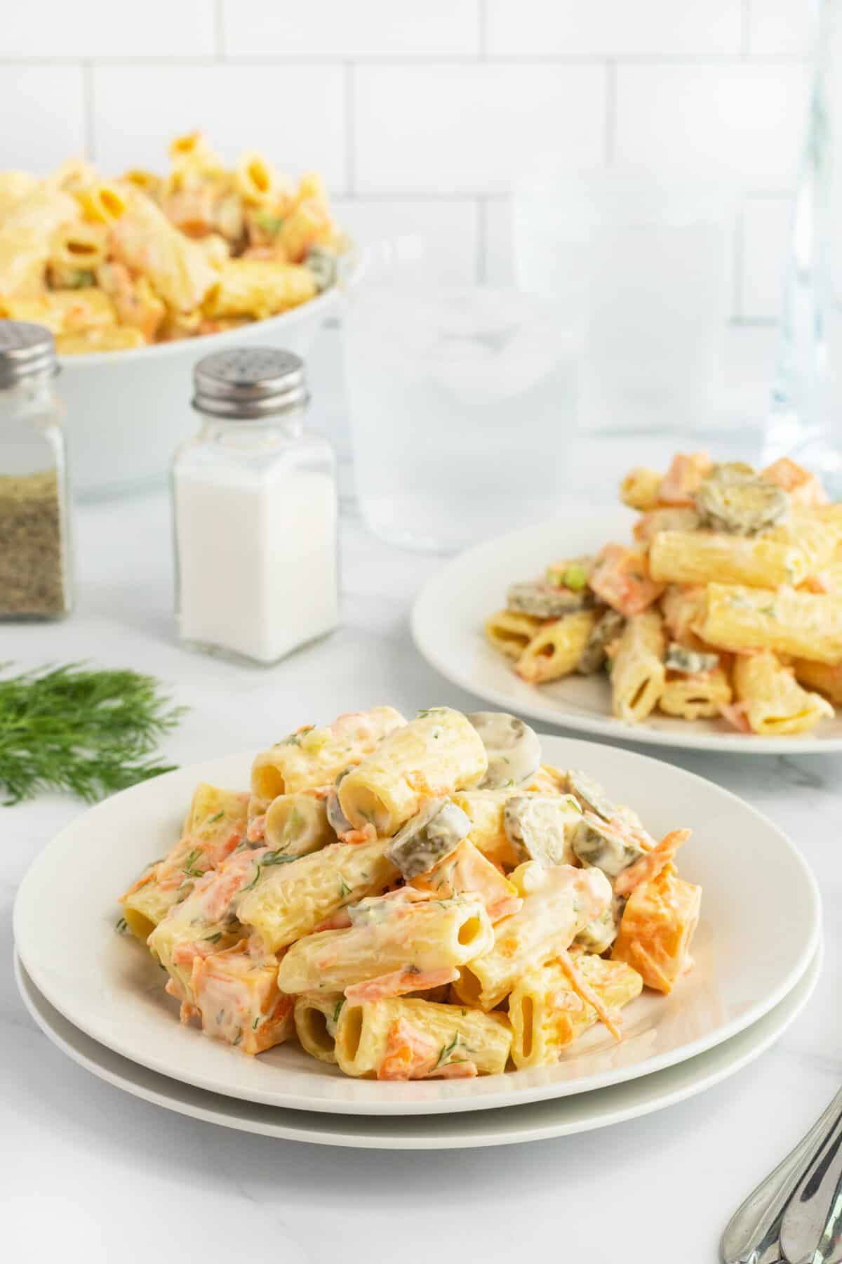 Dill Pickle Pasta Salad on two white plates