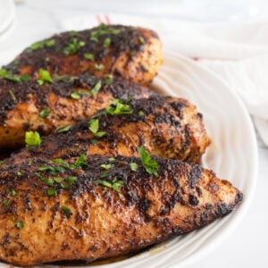 Pan fried chicken breast on platter