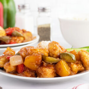 Sweet and sour chicken on white plate