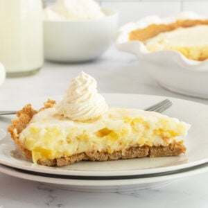 Marshmallow Pineapple Pie on a plate with fork