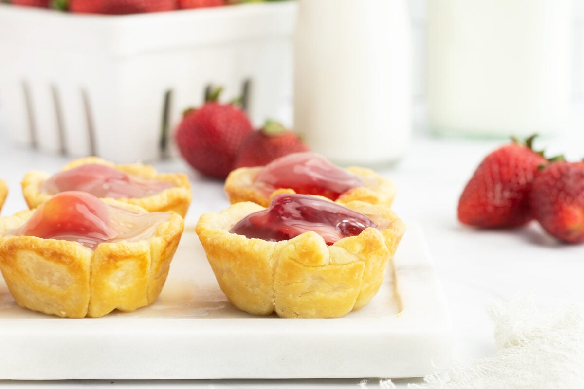 Strawberry Tarts on a white board