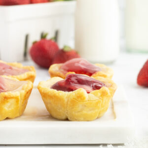 Strawberry Tarts on a white board