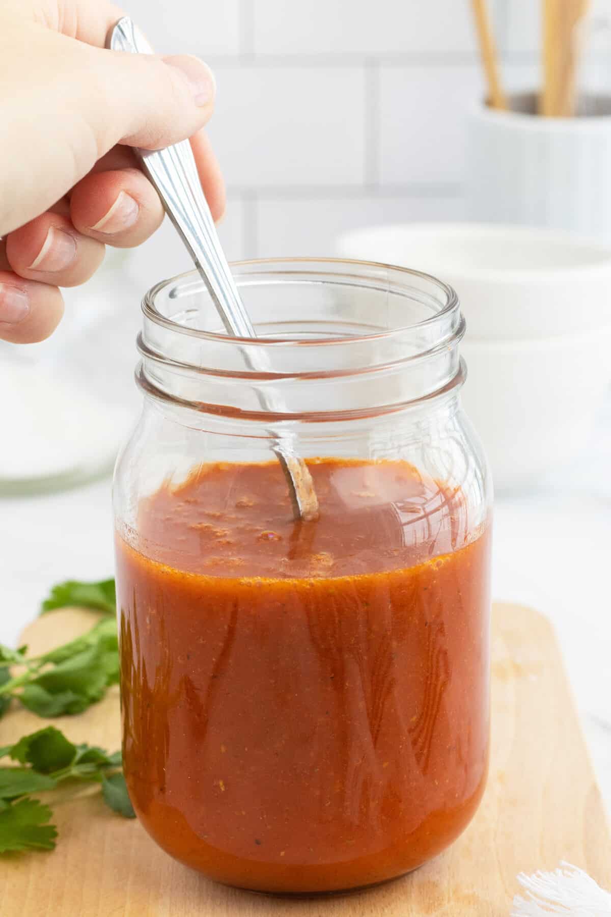 Homemade Catalina dressing in jar with spoon