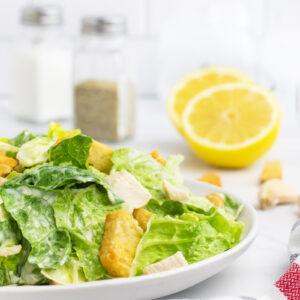 Chicken Caesar Salad close up on plate