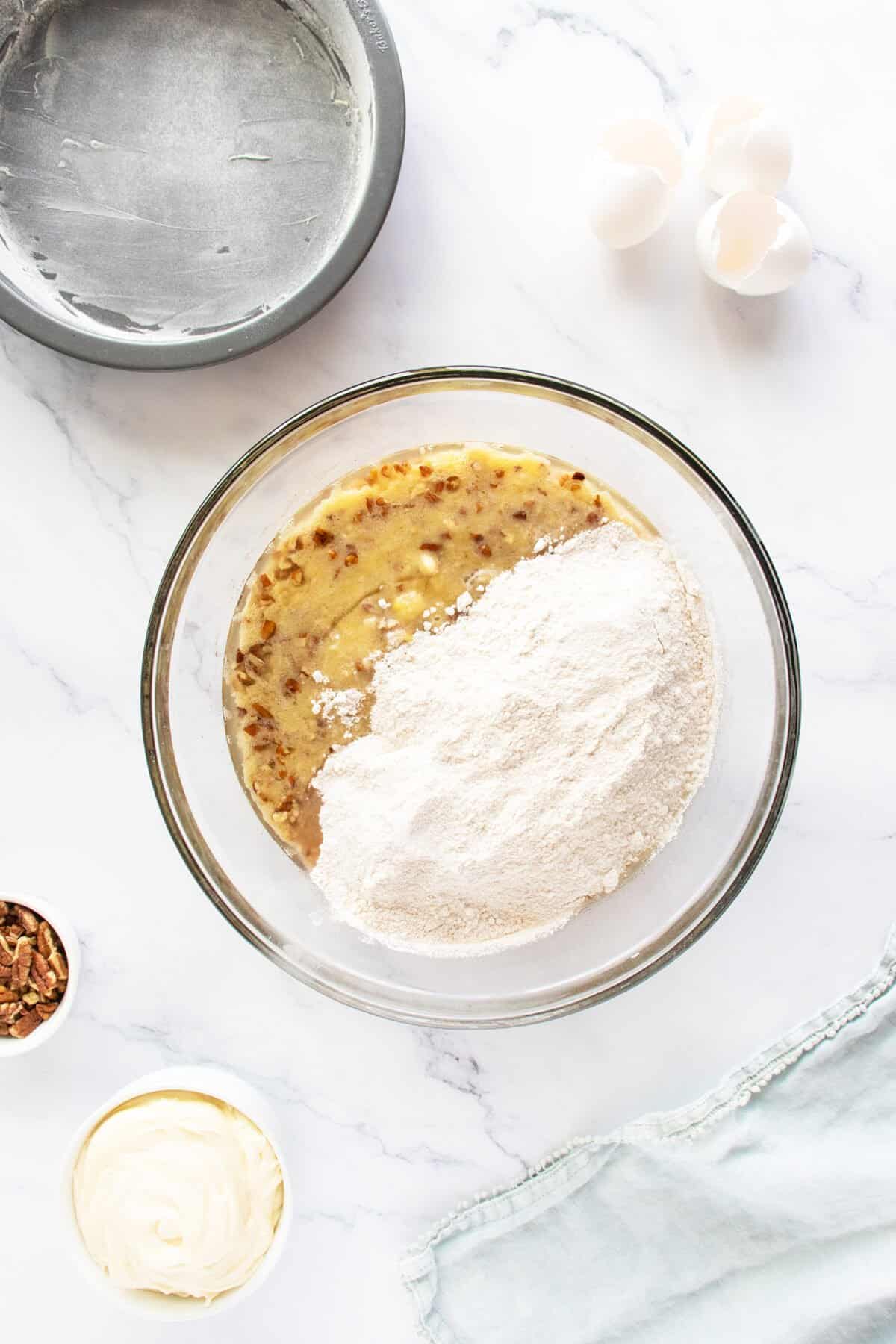 Hummingbird cake dry and wet ingredients in a bowl