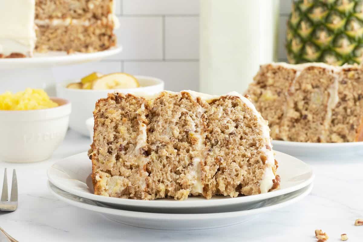 Hummingbird cake slice on a white plate