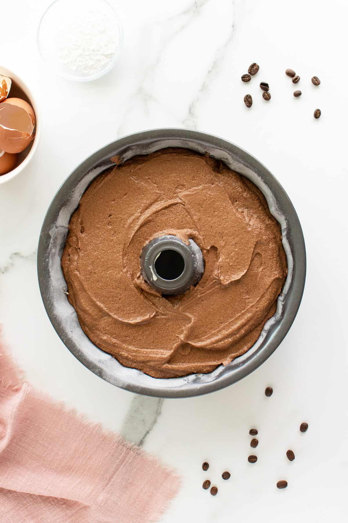 Chocolate pound cake batter in pan