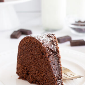 slice of Chocolate pound cake with icing sugar on top