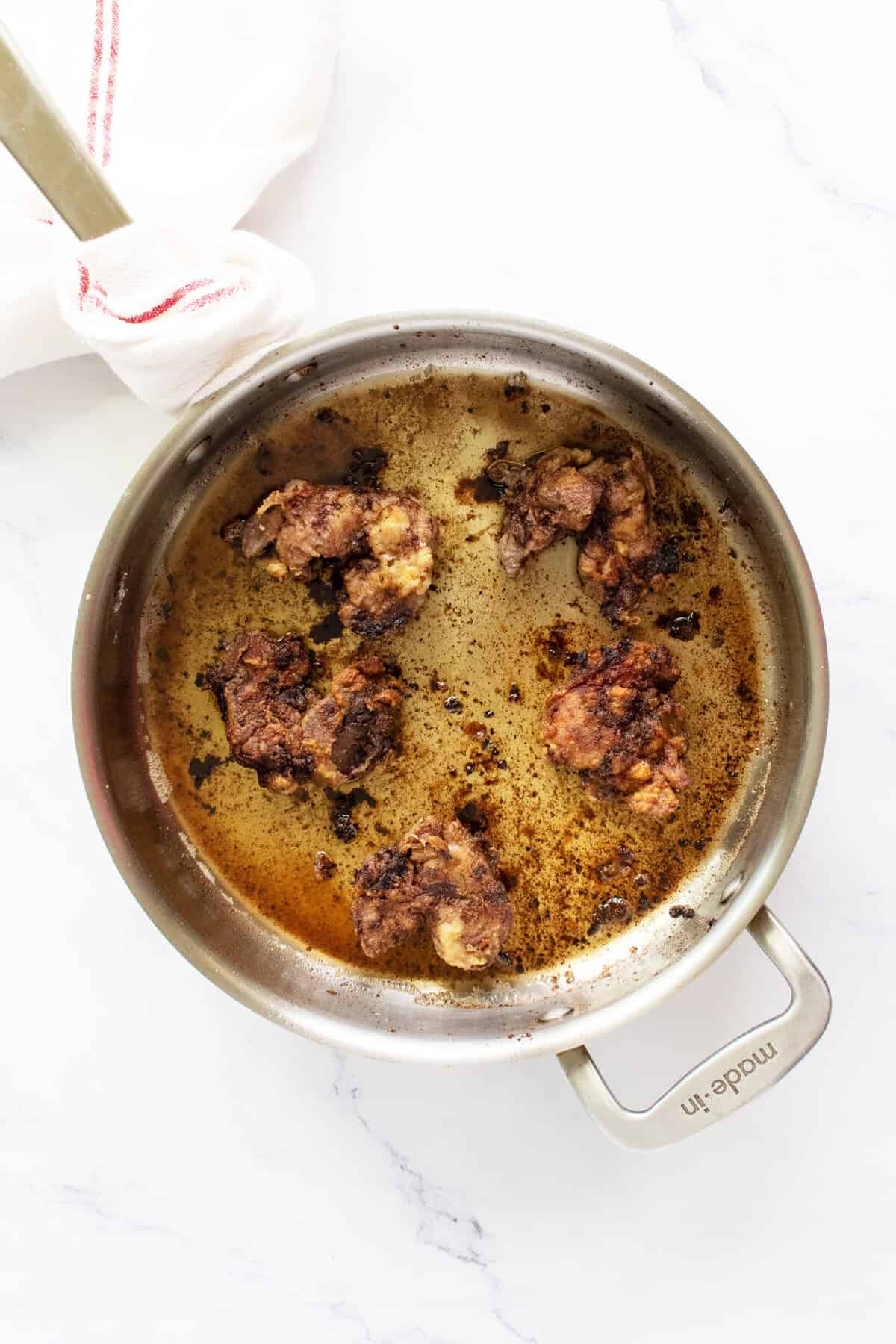 Fried Chicken Livers in a frying pan