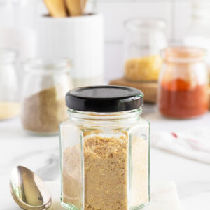 Onion soup mix in a jar with a black lid