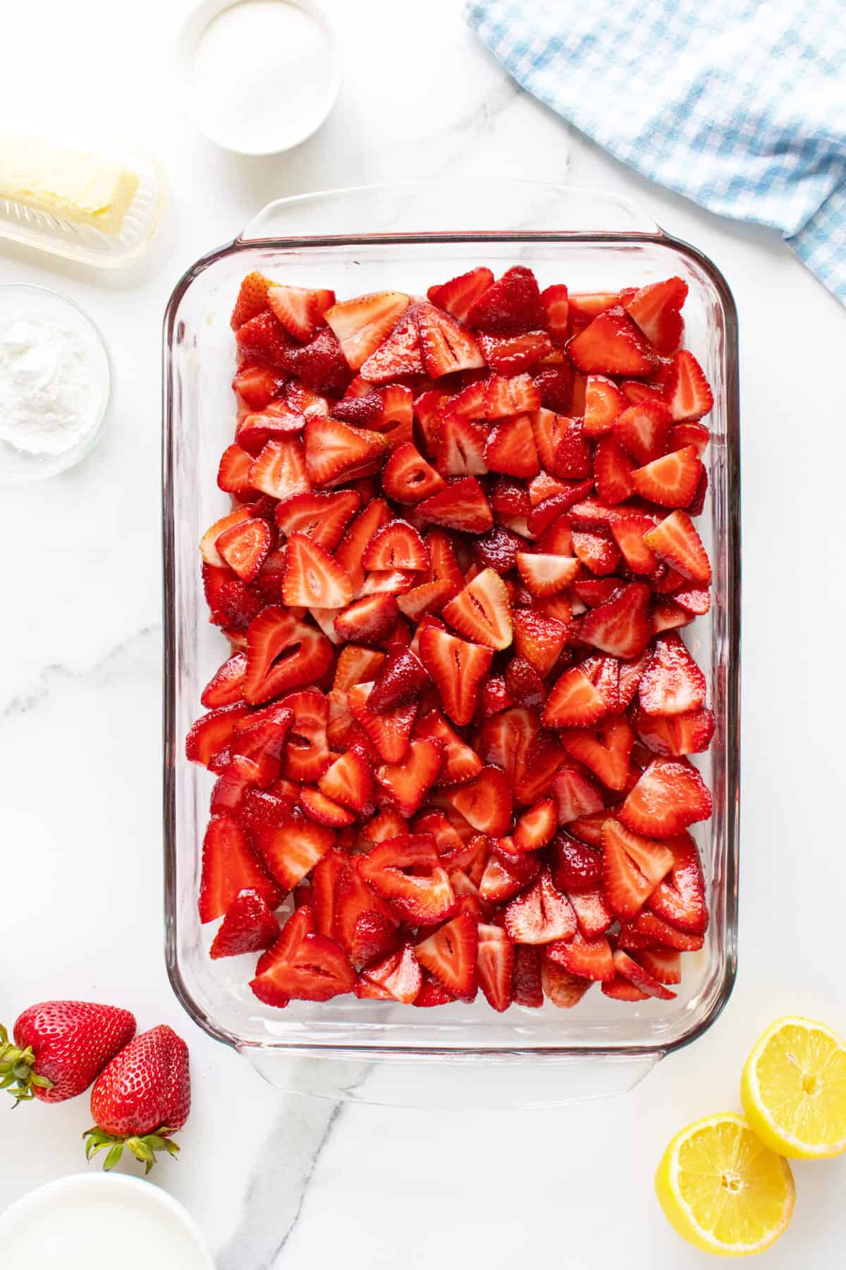 Strawberry Cobbler strawberries in a baking pan
