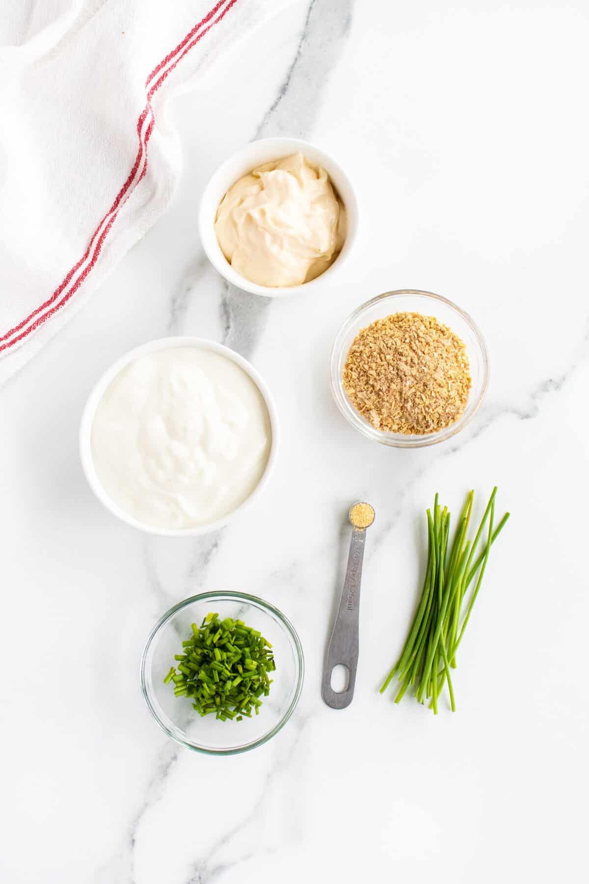 french onion dip ingredients in small bowls