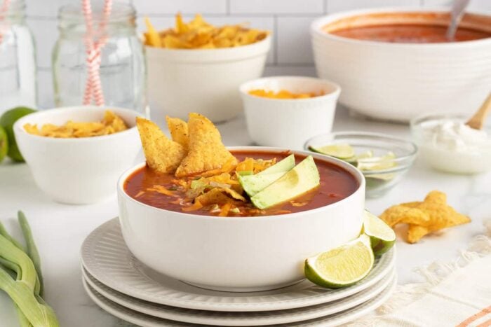 Chicken tortilla soup in a white bowl